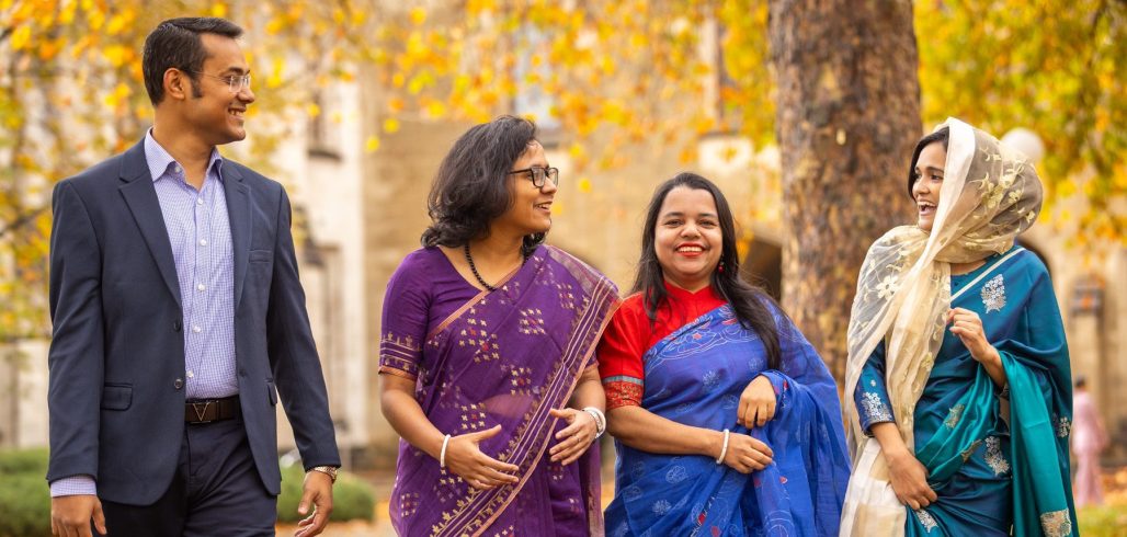 Australia Awards alumni walking together on campus