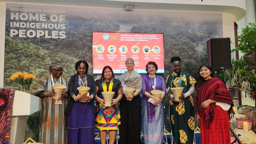 Hla (third from right) participating in the 2025 IUCN World Conservation Congress in Abu Dhabi, UAE, as a panelist at the first-ever Indigenous Peoples Pavilion, speaking about Indigenous environmental knowledge and women’s empowerment.