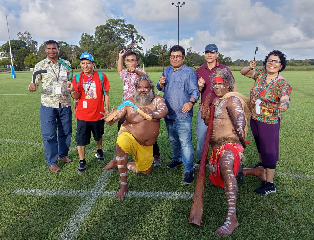 Ching (third from left, back row), including Hla (right, back row), engaging with First Nations communities through cultural exchange and learning about traditional environmental practices grounded in respect for land and nature during their Short Course in Australia.
