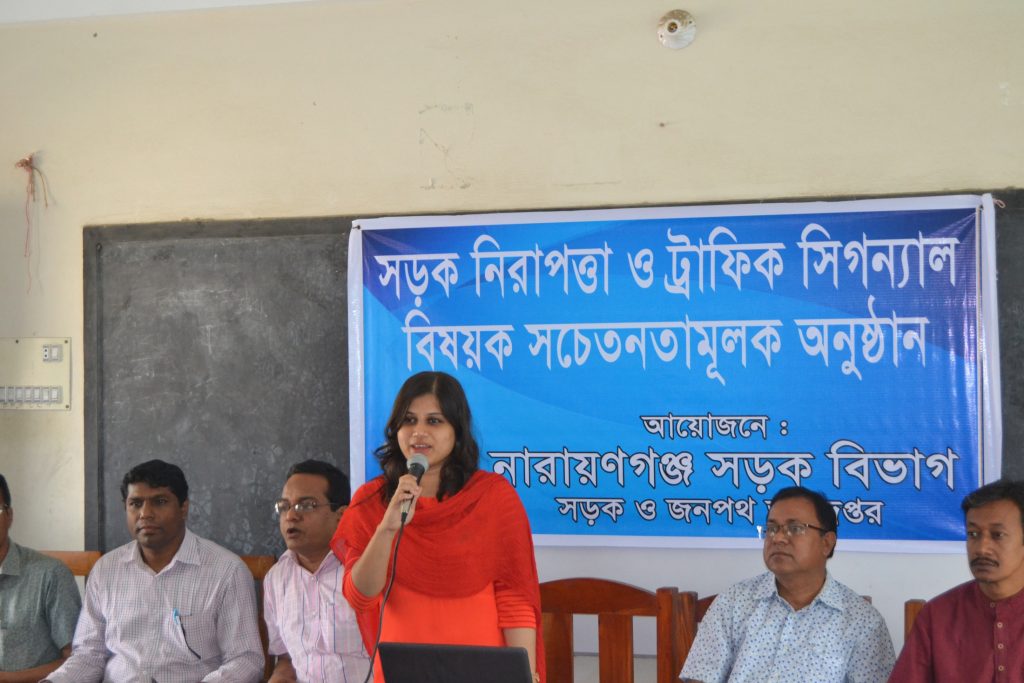 Asfia (middle) conducting a training program on occupational health and safety in Bangladesh.
